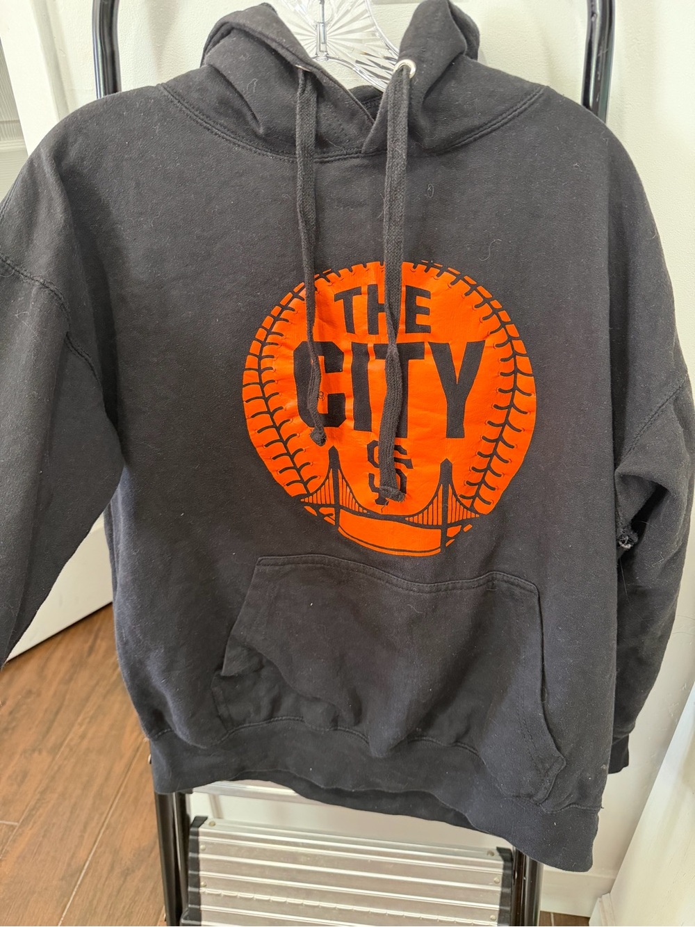Kids Black Crewneck Hoodie with Orange 'The City' Graphic